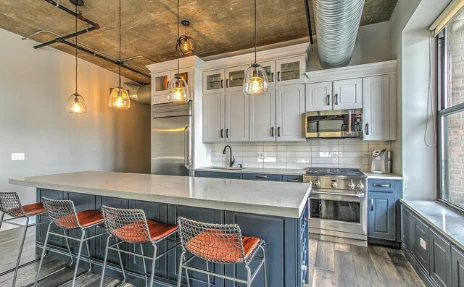 modern kitchen with blue cabinets